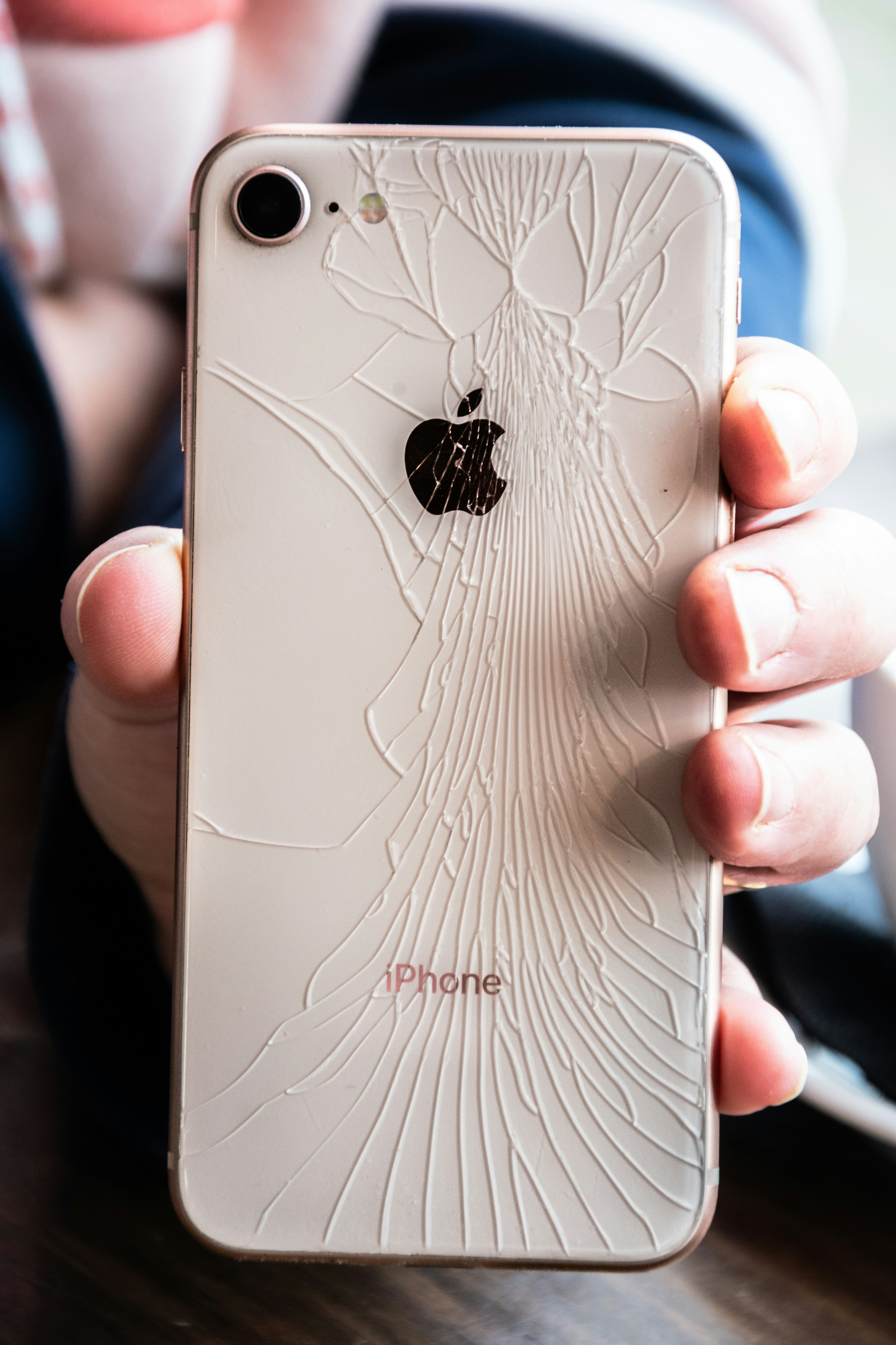 iPhone with shattered back glass